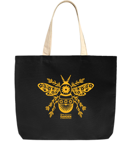 black back with beige handles and gold stylized bee